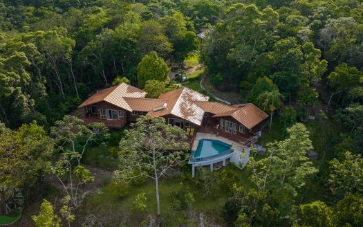 The prominent Kukulkan Villa lies nestled in a 50-Acre reserve of tropical jungle with over ½ mile of invaluable frontage on the popular Macal River.